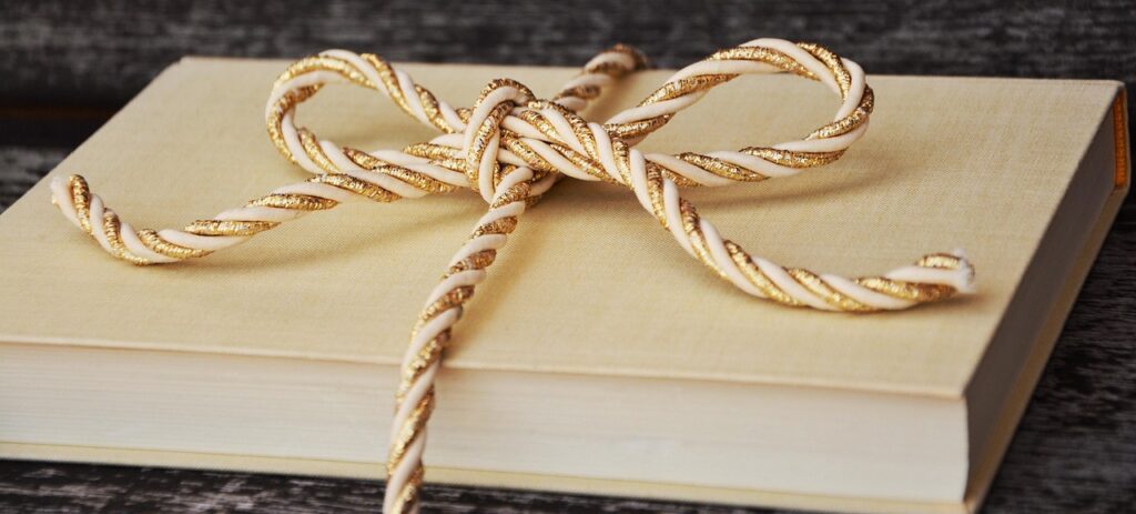 a book, gift, cord, gold cord, golden, packaging, wrap up, wrapped up, gift wrapping, christmas gift, book gift, a book, gift, gift, gift, wrap up, wrap up, christmas gift, book gift, book gift, book gift, book gift, book gift